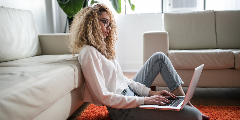 adult woman working on her budget